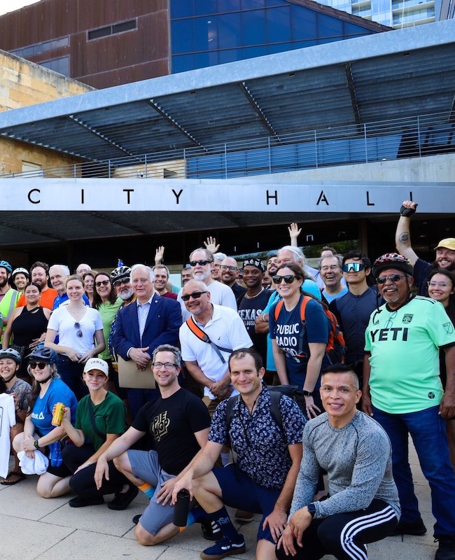 Group in front of Austin City Hall on Bike to Work Day.
